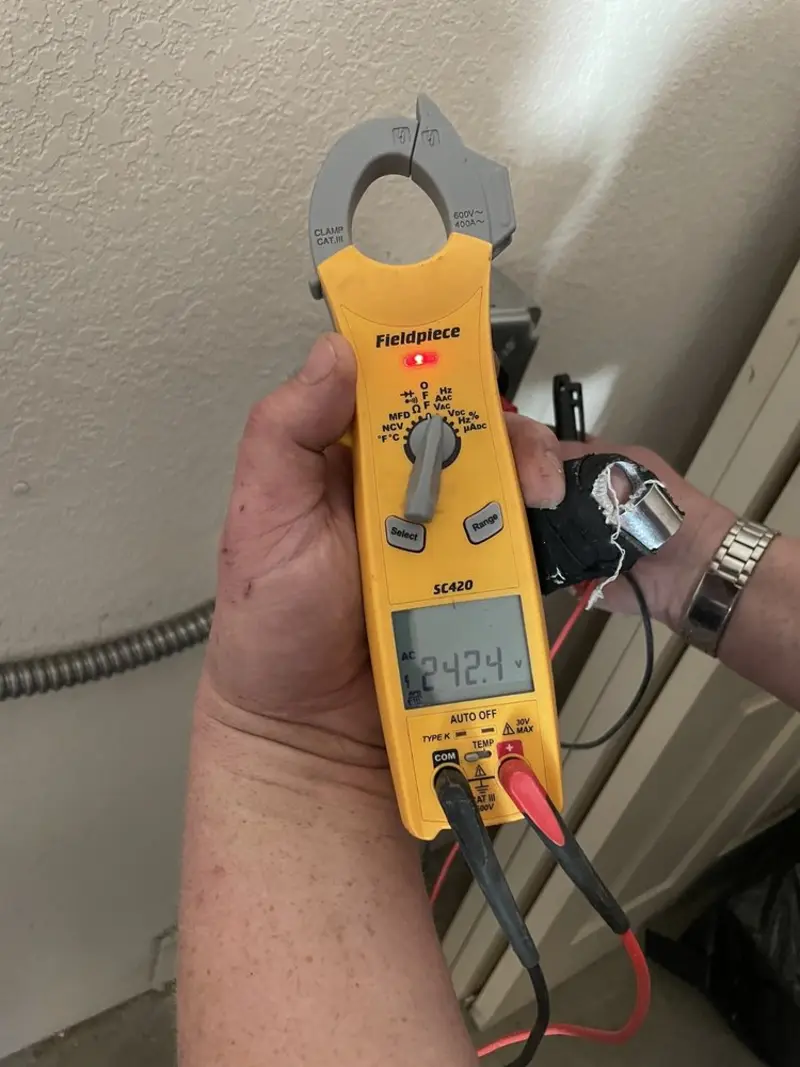 Voltage testing with clamp meter during Generator Installation in Lexington